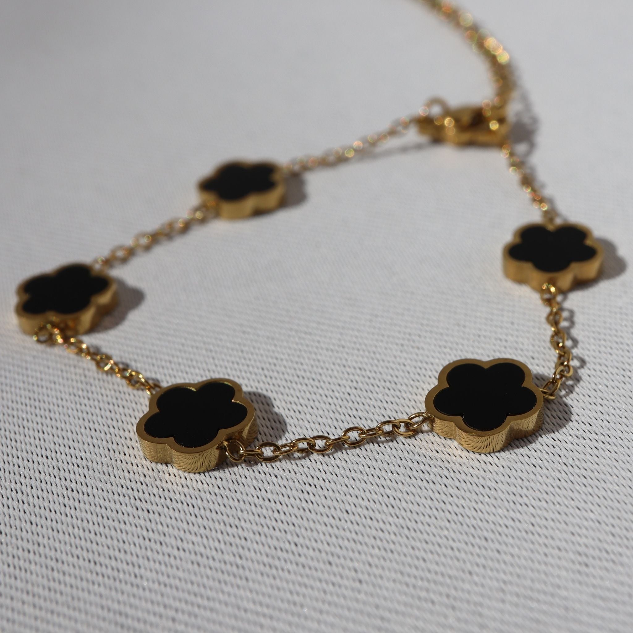 Midnight Clover Bracelet, 18K Gold Plated Steel – Waterproof Gold Jewelry – Aella Jewelry Co.