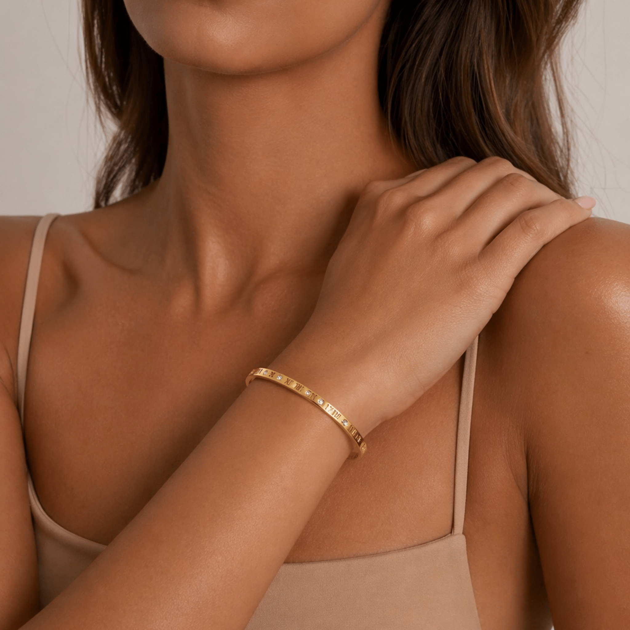 The Gold Standard Bangle – Waterproof, Tarnish - Free Gold Roman Numeral Bracelet – Waterproof Gold Jewelry – Aella Jewelry Co.
